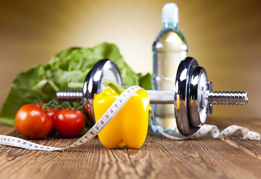 Dumbbell, zelenjava in centimeter
